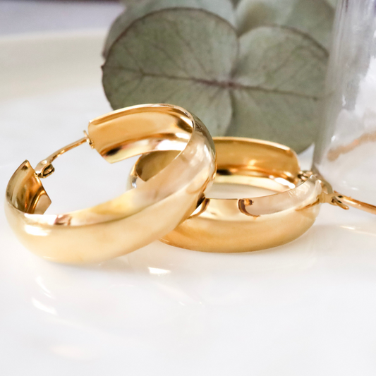 18ct Gold Plated Surgical Steel Large Hoop Earrings - 26mm x 8mm - Luxurious Statement Pieces. Expertly crafted from high-quality surgical steel and plated with 18ct gold, these stunning hoops exude luxury and sophistication.
