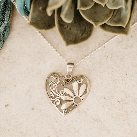 Sterling Silver Heart Shaped Pendant with Daisy