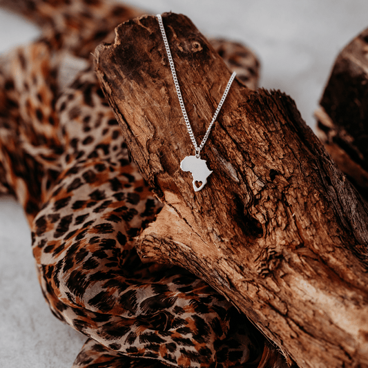 Sterling Silver Africa Pendant Necklace with Heart Cut-Out