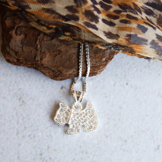Sterling Silver Dog with CZ's - Canine companion design expertly crafted from premium sterling silver, featuring sparkling CZ's for a luxurious look